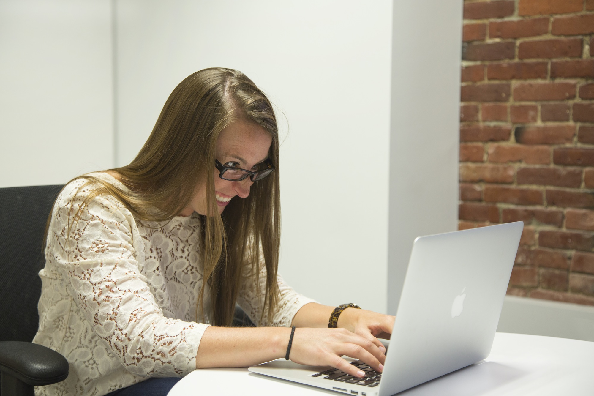 Female professional enjoying the benefits of her LinkedIn training